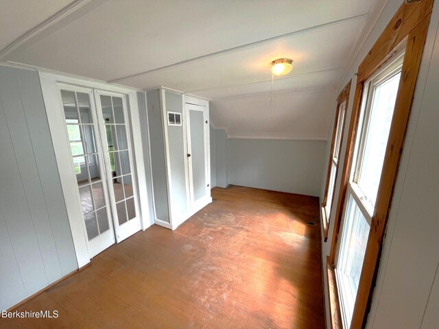 22 Marietta St, North Adams, MA 01247 - empty room featuring wood finished floors and lofted ceiling