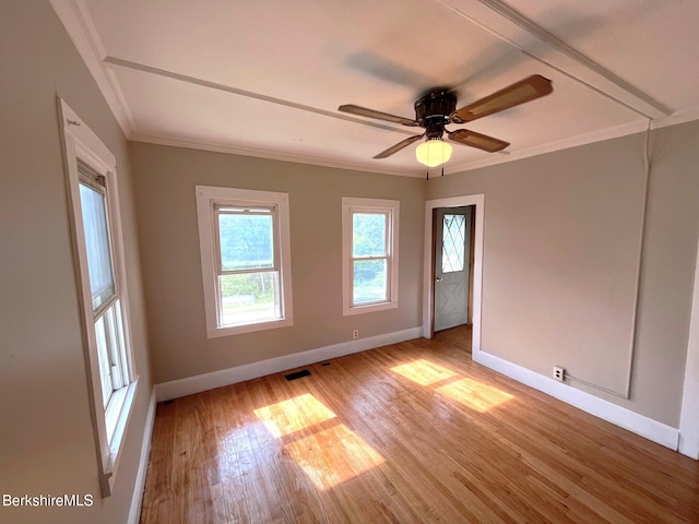 22 Marietta St, North Adams, MA 01247 - spare room featuring ornamental molding, light wood-style flooring, and ceiling fan