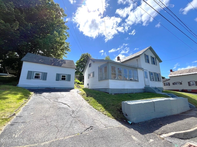 22 Marietta St, North Adams, MA 01247 - view of front of property featuring a front lawn and driveway