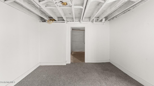 finished below grade area featuring carpet flooring