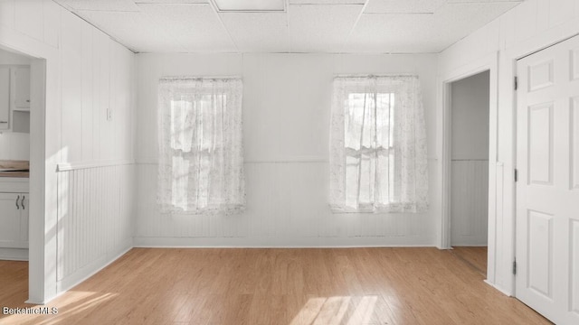 spare room with light wood-style flooring