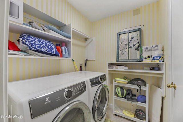 laundry area with washer and dryer