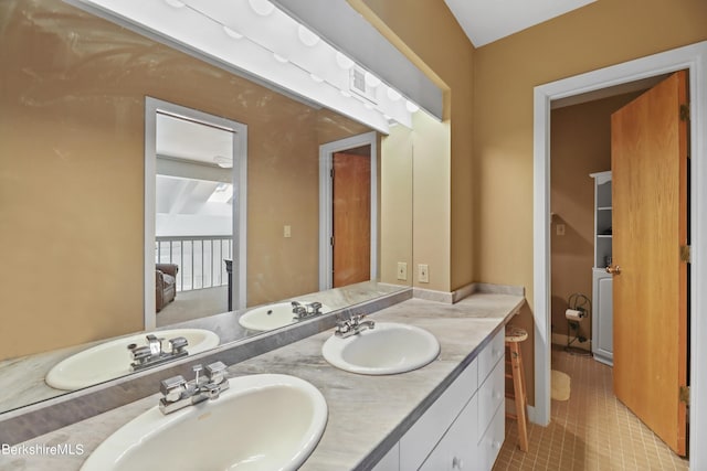 bathroom featuring vanity and tile patterned floors