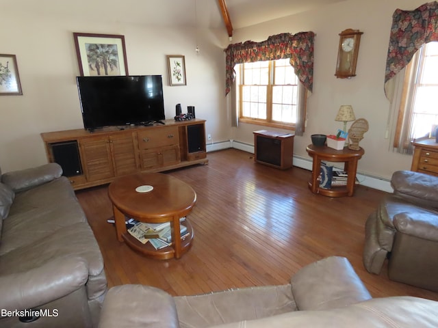 living room with a baseboard radiator, baseboards, and hardwood / wood-style floors