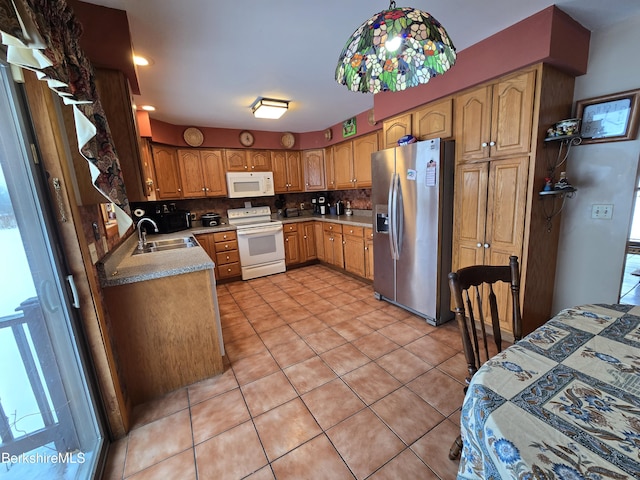 kitchen with sink, pendant lighting, white appliances, decorative backsplash, and light tile patterned floors