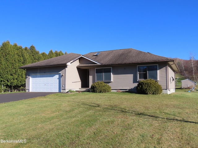 ranch-style house with a front lawn and a garage