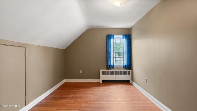 202 Park Ave, Dalton, MA 01226 - bonus room with radiator, wood finished floors, and lofted ceiling