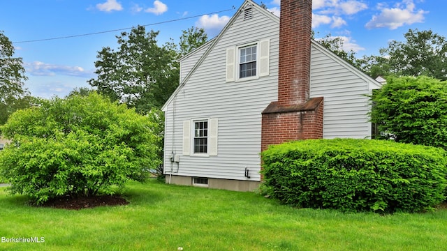 202 Park Ave, Dalton, MA 01226 - view of property exterior featuring a chimney and a lawn