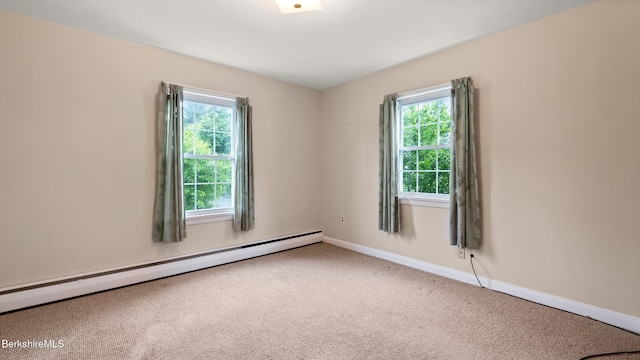 202 Park Ave, Dalton, MA 01226 - carpeted empty room with a baseboard radiator and healthy amount of natural light