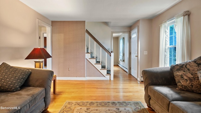 202 Park Ave, Dalton, MA 01226 - foyer entrance featuring light wood-style floors, baseboard heating, and stairs