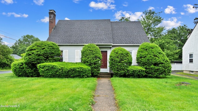 202 Park Ave, Dalton, MA 01226 - cape cod-style house featuring a chimney, entry steps, and a shingled roof