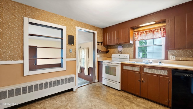 202 Park Ave, Dalton, MA 01226 - kitchen with dishwasher, white electric range, radiator, light countertops, and light floors