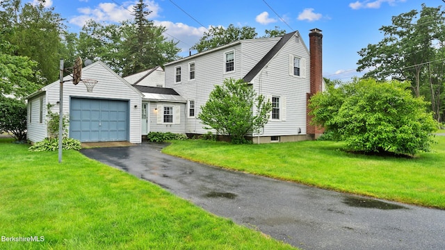 202 Park Ave, Dalton, MA 01226 - view of front facade with a chimney and a front yard