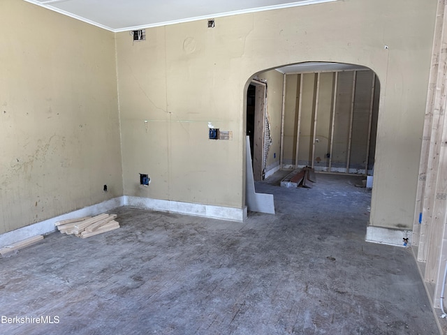 interior space with arched walkways and ornamental molding