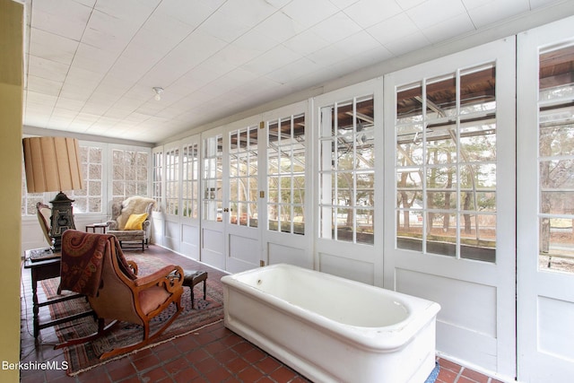 sunroom / solarium with plenty of natural light