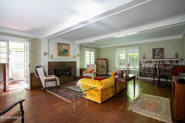 82 W Ave, Great Barrington, MA 01230 - living room featuring wallpapered walls, ornamental molding, wood finished floors, a fireplace, and beam ceiling