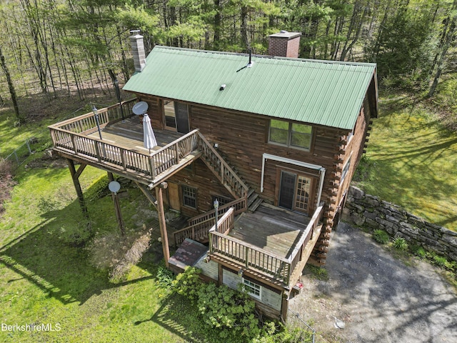 189 Cross Place Rd, Washington, MA 01223 - view of front facade featuring a chimney, a wooden deck, and log exterior