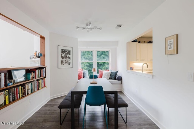 80 Taconic Ave # 14, Great Barrington, MA 01230 - dining area with dark wood-style flooring and a chandelier