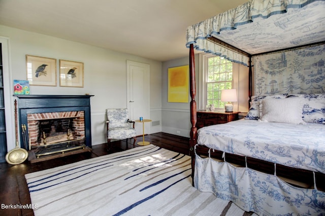 764 E Hill Rd, New Marlborough, MA 01230 - bedroom featuring wood finished floors and a fireplace
