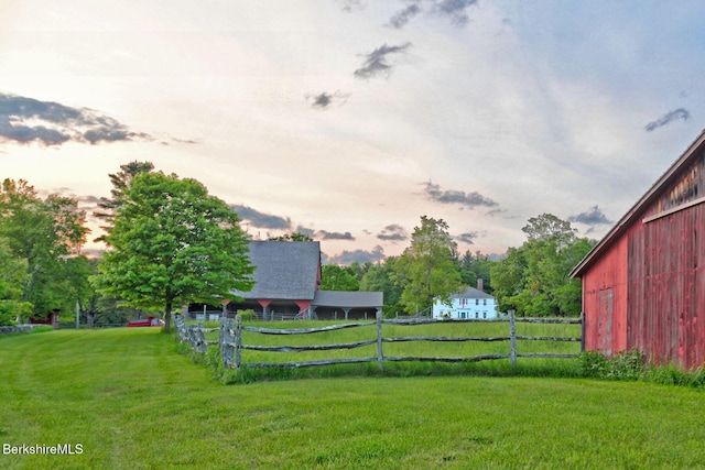 764 E Hill Rd, New Marlborough, MA 01230 - yard at dusk featuring an outbuilding and a barn