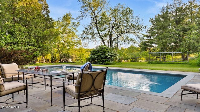 764 E Hill Rd, New Marlborough, MA 01230 - swimming pool featuring a patio, a lawn, and view of wooded area