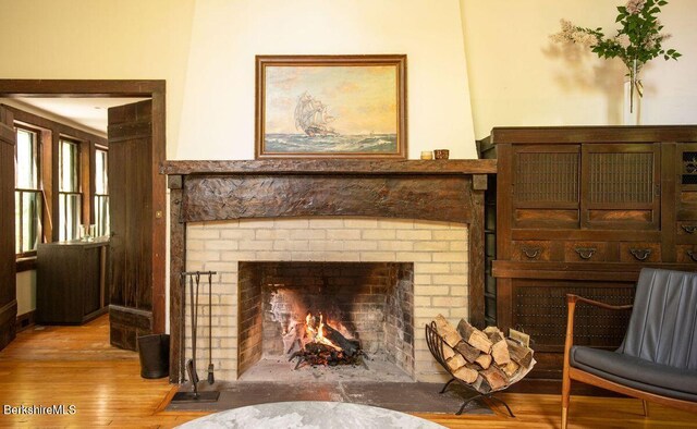 9 Yale Hill Rd, Stockbridge, MA 01262 - sitting room with a brick fireplace and wood finished floors