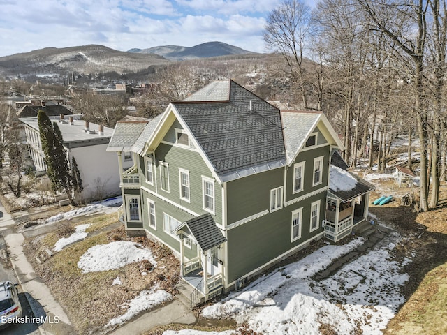 exterior space featuring a mountain view