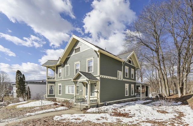 view of front of home featuring a shingled roof