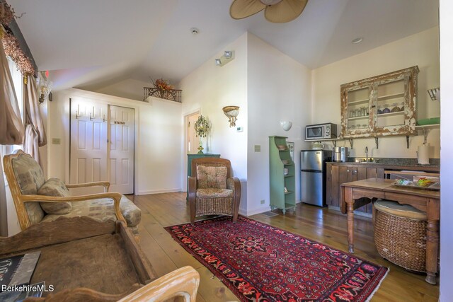 518 Main St, Great Barrington, MA 01230 - living room featuring wood-type flooring, vaulted ceiling, ceiling fan, and sink