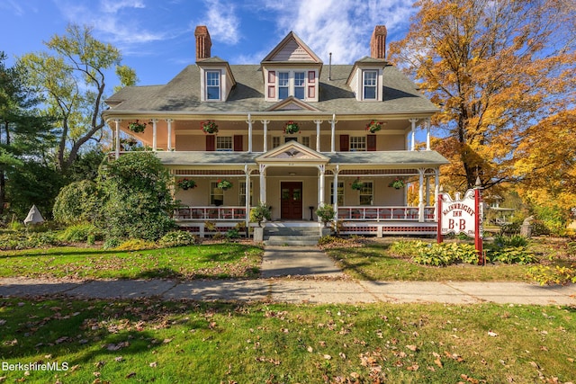 victorian home featuring covered porch