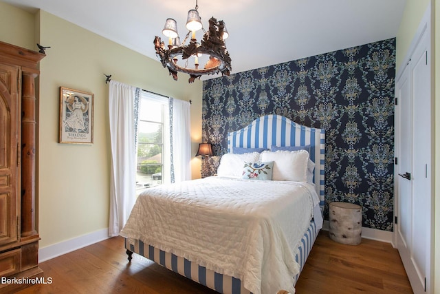 34 Bridge St, Great Barrington, MA 01230 - bedroom with a chandelier and wood finished floors