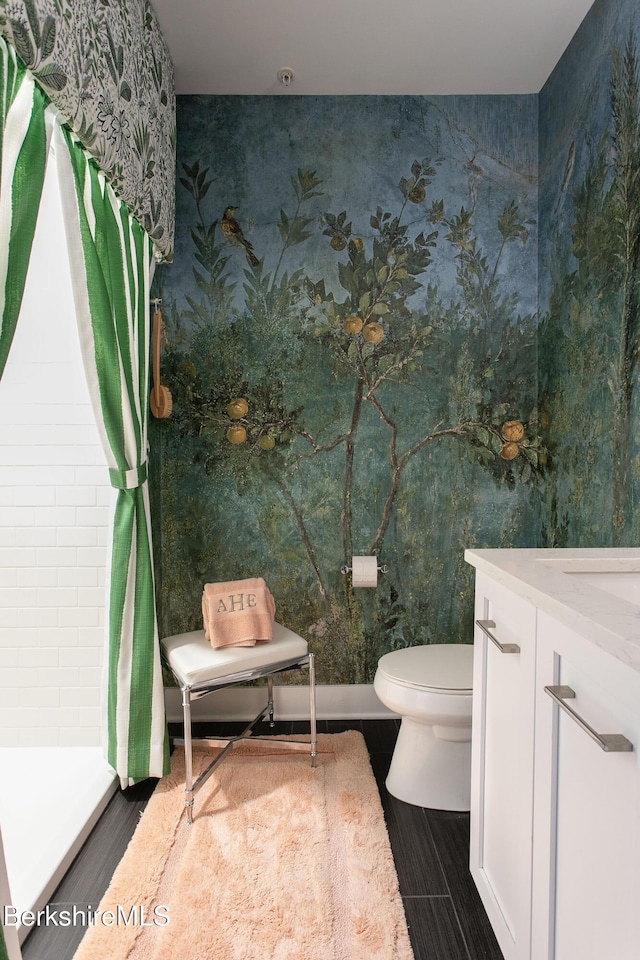 34 Bridge St, Great Barrington, MA 01230 - bathroom featuring tiled shower, vanity, and wallpapered walls