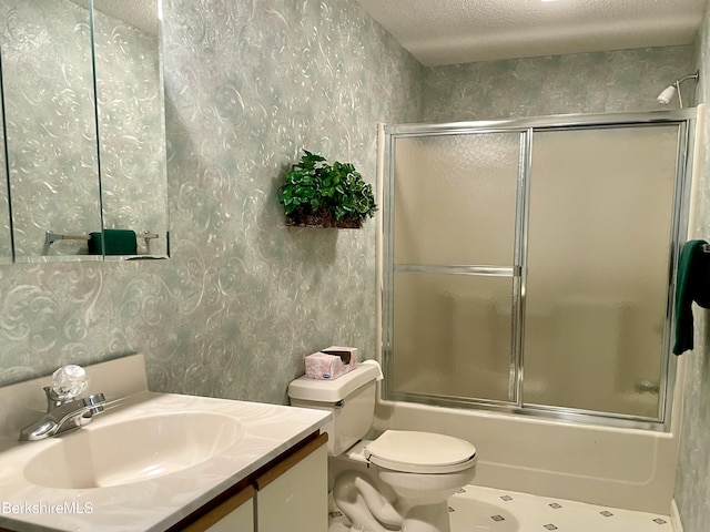 50 Walden Ln, Pittsfield, MA 01201 - bathroom featuring vanity, wallpapered walls, a textured ceiling, and bath / shower combo with glass door