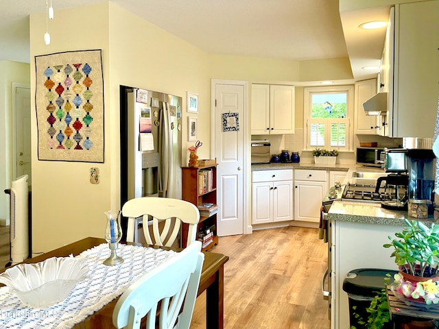 50 Walden Ln, Pittsfield, MA 01201 - kitchen featuring light wood-style flooring, under cabinet range hood, light countertops, white cabinetry, and recessed lighting