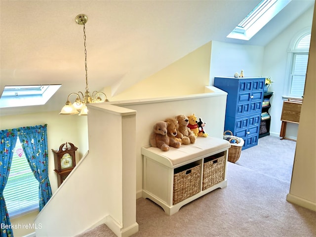 50 Walden Ln, Pittsfield, MA 01201 - corridor with a skylight, vaulted ceiling, an upstairs landing, and light colored carpet
