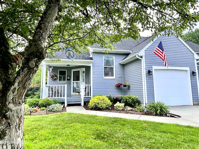 50 Walden Ln, Pittsfield, MA 01201 - view of front of home with driveway, an attached garage, covered porch, a front lawn, and roof with shingles