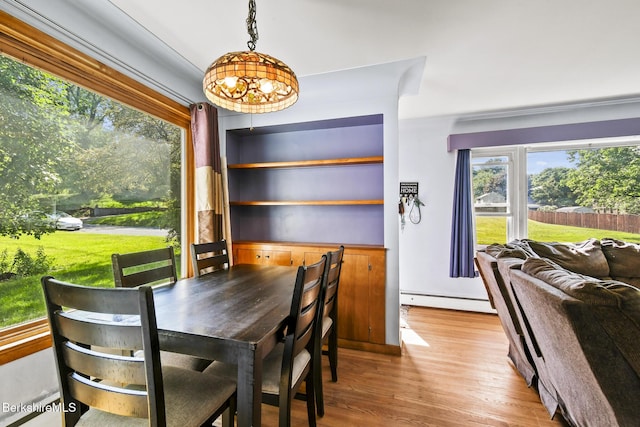 68 Tower Rd, Dalton, MA 01226 - dining space with a baseboard heating unit and wood finished floors