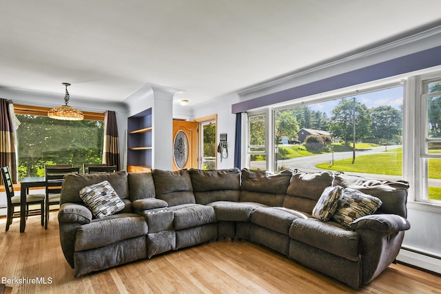 68 Tower Rd, Dalton, MA 01226 - living room with plenty of natural light, wood finished floors, and baseboard heating