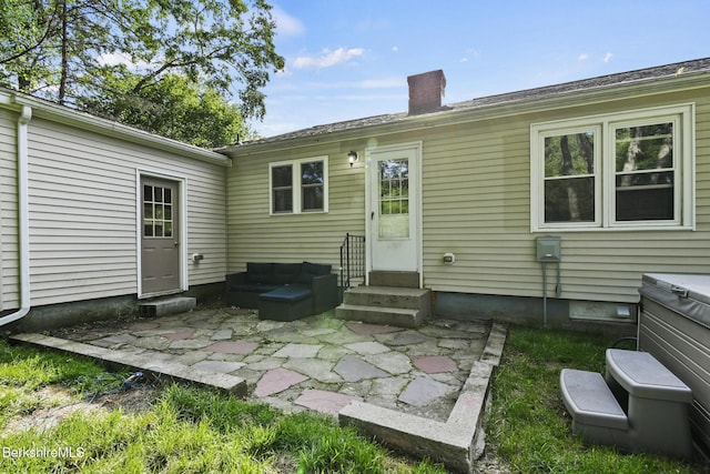 68 Tower Rd, Dalton, MA 01226 - rear view of property with entry steps, a chimney, a patio area, and outdoor lounge area