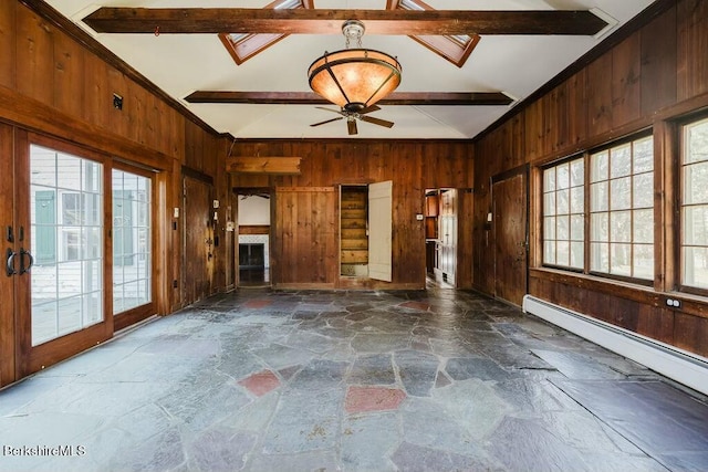 unfurnished living room featuring lofted ceiling with beams, ceiling fan, wooden walls, and baseboard heating