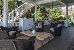 view of patio / terrace featuring stairs and outdoor lounge area