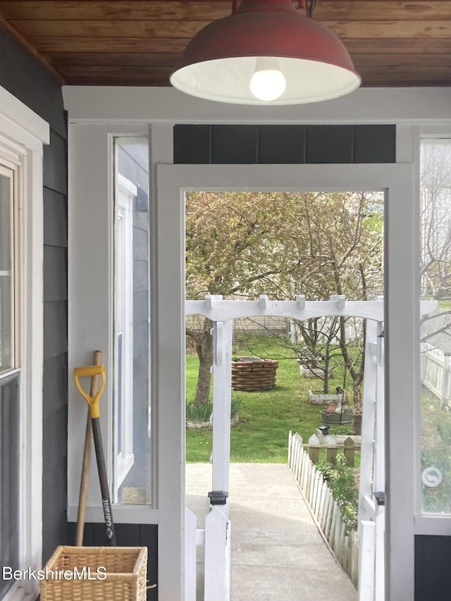 doorway featuring wooden ceiling
