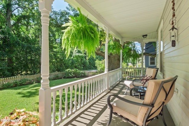 balcony featuring a porch