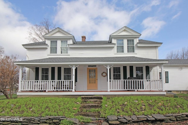 196 Huntington Rd, Worthington, MA 01098 - view of front of property with covered porch, roof with shingles, and a chimney
