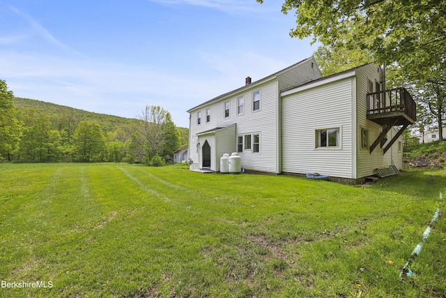 203 Main St, Hancock, MA 01237 - rear view of house with a lawn, a chimney, and a deck