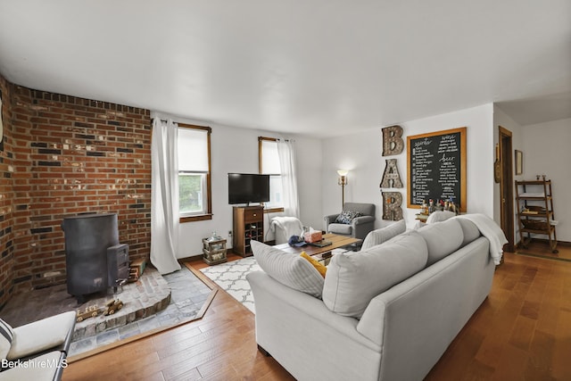 203 Main St, Hancock, MA 01237 - living area with a wood stove and hardwood / wood-style flooring