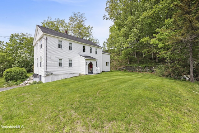 203 Main St, Hancock, MA 01237 - back of house with a chimney and a lawn