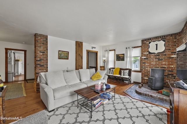 203 Main St, Hancock, MA 01237 - living area with a wood stove and wood finished floors
