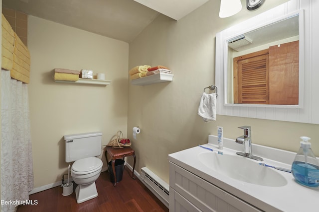 203 Main St, Hancock, MA 01237 - bathroom with baseboard heating, wood finished floors, toilet, vanity, and baseboards