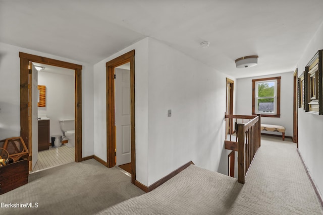 203 Main St, Hancock, MA 01237 - hallway featuring an upstairs landing, light carpet, and baseboards
